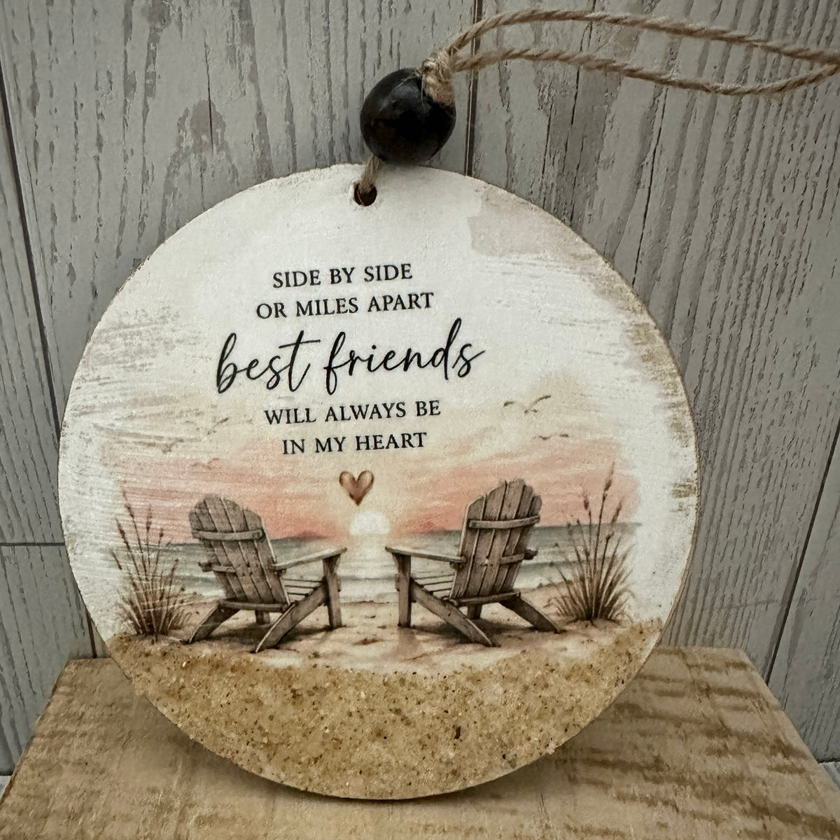 Handcrafted best friends ornament with two Adirondack chairs sunset beach scene and authentic Outer Banks sand