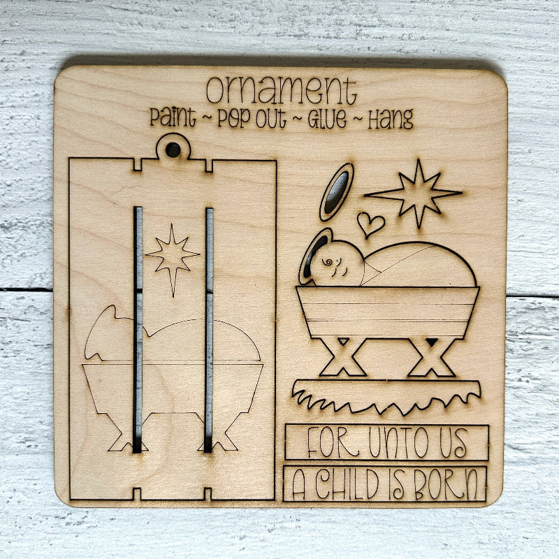 Wooden Nativity ornament kit with laser-cut shapes and For Unto Us A Child is Born 